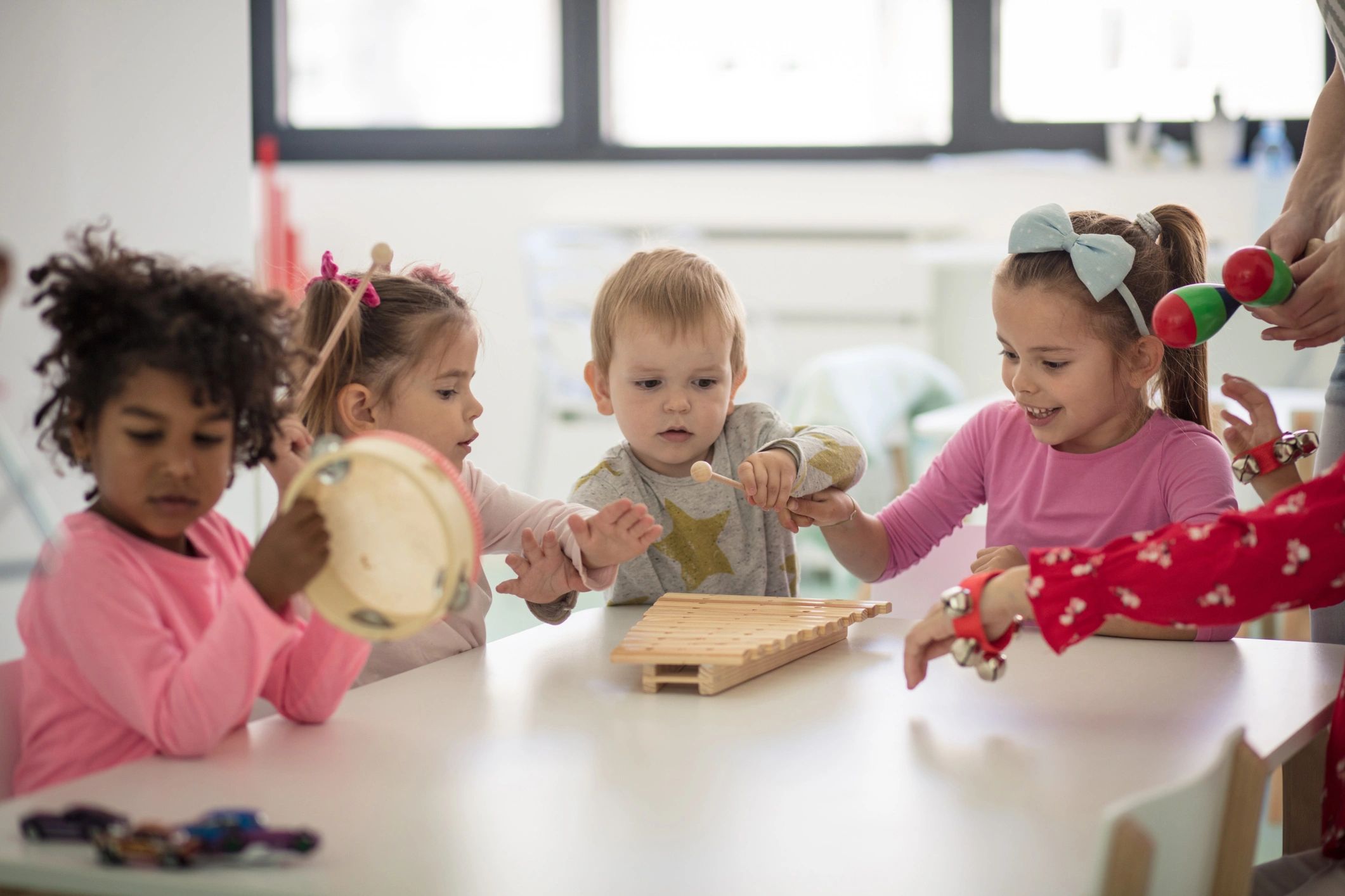 Children making music in preschool